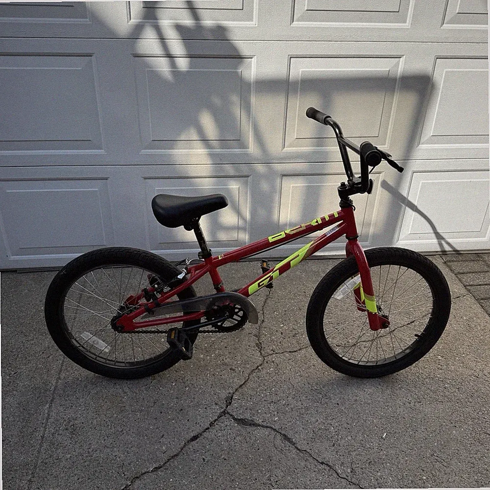 GT Unisex Kids BMX Bike Red/Yellow/Black 1-Speed No Suspension BMX Bars